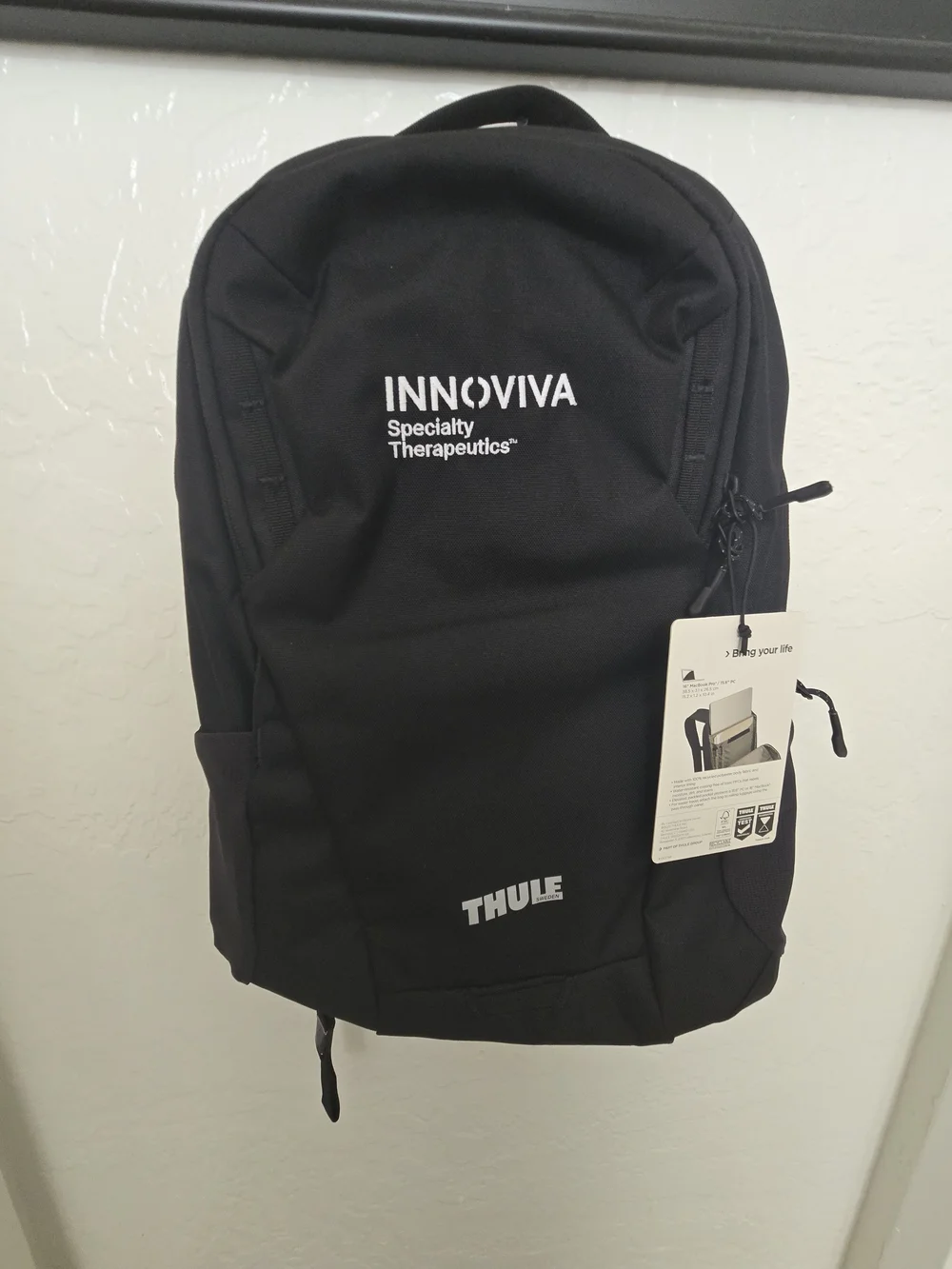 Thule Black Backpack with Innoviva Specialty Therapeutics Logo